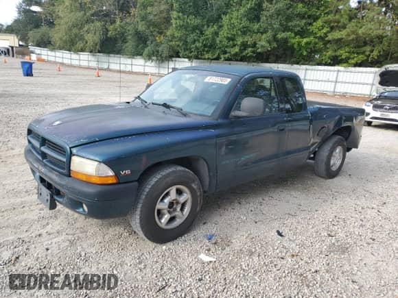 1998 Dodge Dakota SLT with VIN 1B7GL22X0WS571187, listed as a Copart auction lot 81722905 with 129,295 mi miles and Salvage title. Bid and sale history available at DreamBid. Image 1.