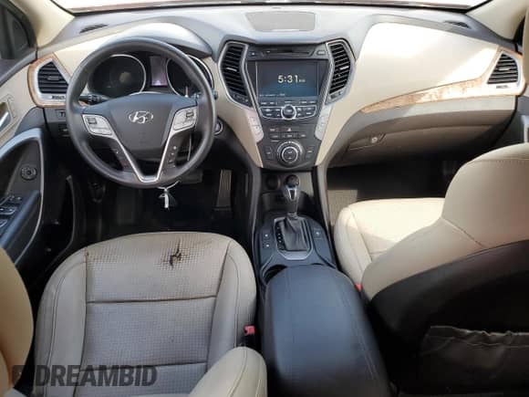 2016 Hyundai Santa Fe z VIN 5XYZWDLA3GG313145, wystawiony jako Copart lot #85717215 z przebiegiem Nie podano mil oraz Szkoda całkowita • Salvage title. Historia ofert i sprzedaży dostępna na DreamBid. Obrazek 8.