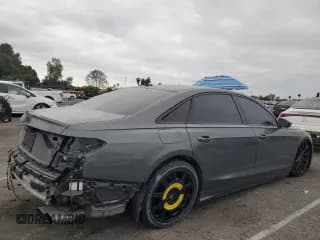 ✅ 2023 Audi S8 • VIN: WAULSAF83PN016195 • Лот: 51859105. Опубликован ранее на Copart с пробегом 16 492 миль. Бесплатный доступ к архиву аукционных продаж из США и подробный отчёт об истории автомобиля на DreamBid. Изображение 3.