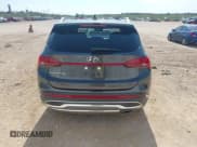 ✅ 2021 Hyundai Santa Fe SEL • VIN: 5NMS64AJ2MH309948 • Lot: 43392363. Listed on IAAI with 29,182 mi. Free auction sales archive from the USA and detailed vehicle history report at DreamBid. Image 16.