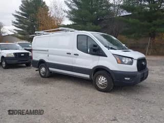 ✅ 2023 Ford Transit Cargo • VIN: 1FTBR2Y87PKA30017 • Lot: 43521186. Listed on IAAI with 53,466 mi. Free auction sales archive from the USA and detailed vehicle history report at DreamBid. Image 1.