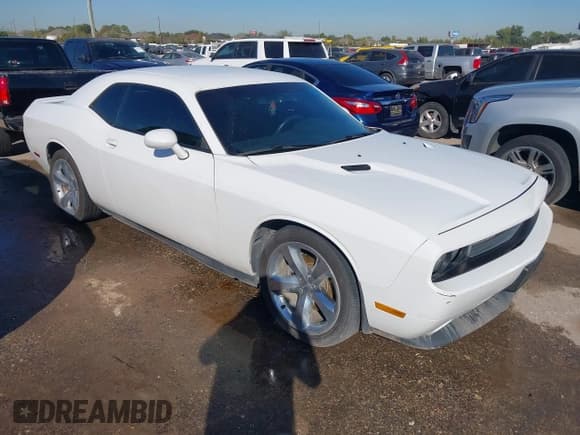 ✅ 2014 Dodge Challenger SXT • VIN: 2C3CDYAG1EH153778 • Лот: 43589521. Опубликован ранее на IAAI с пробегом 185 848 миль. Бесплатный доступ к архиву аукционных продаж из США и подробный отчёт об истории автомобиля на DreamBid. Изображение 1.