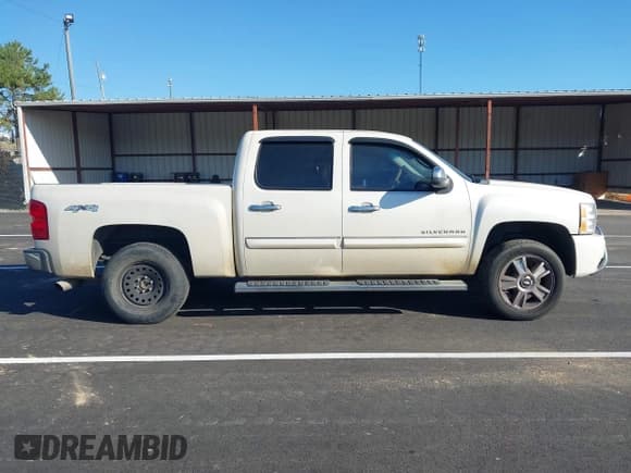 ✅ 2013 Chevrolet Silverado 1500 LTZ • VIN: 3GCPKTE74DG365847 • Lot: 43334980. Listed on IAAI with 264,211 mi. Free auction sales archive from the USA and detailed vehicle history report at DreamBid. Image 13.