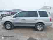 2004 Honda Pilot LX with VIN 2HKYF18144H541999, listed as a IAAI auction lot 40994494 with 265,086 mi miles and . Bid and sale history available at DreamBid. Image 14.