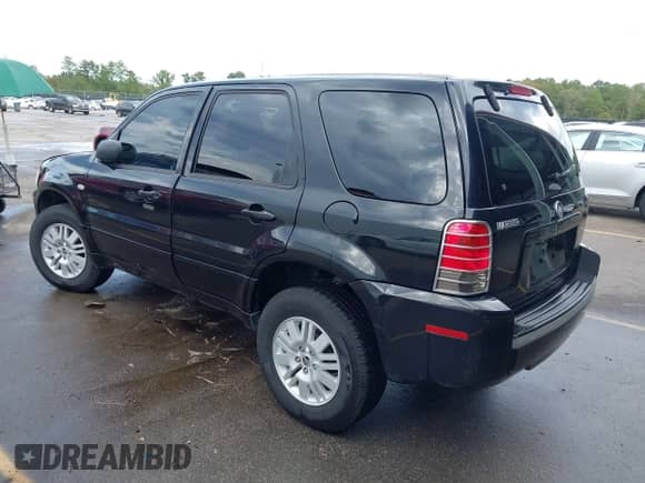 2006 Mercury Mariner Luxury with VIN 4M2YU56106KJ09196, listed as a IAAI auction lot 43307535 with 208,433 mi miles and . Bid and sale history available at DreamBid. Image 3.