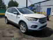 2018 Ford Escape SE z VIN 1FMCU9GD0JUB84831, wystawiony jako Copart lot #67372885 z przebiegiem 149 187 mil mil oraz Szkoda całkowita • Salvage title. Historia ofert i sprzedaży dostępna na DreamBid. Obrazek 4.