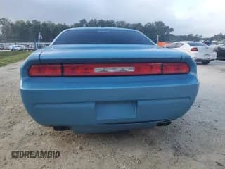 ✅ 2012 Dodge Challenger SXT Plus • VIN: 2C3CDYAG7CH100693 • Lot: 84772665. Wystawiony na Copart z przebiegiem 129 067 mil. Bezpłatny archiwum sprzedaży aukcyjnych z USA i szczegółowy raport historii pojazdu na DreamBid. Zdjęcie 6.