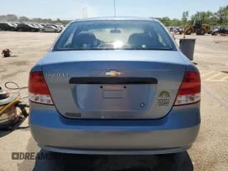 ✅ 2006 Chevrolet Aveo LT • VIN: KL1TG56616B579117 • Lot: 68036795. Wystawiony na Copart z przebiegiem 94 824 mil. Bezpłatny archiwum sprzedaży aukcyjnych z USA i szczegółowy raport historii pojazdu na DreamBid. Zdjęcie 6.