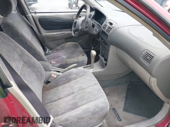 ✅ 2000 Toyota Corolla VE • VIN: 1NXBR18E5YZ351233 • Lot: 42648918. Listed on IAAI with 202,723 mi. Free auction sales archive from the USA and detailed vehicle history report at DreamBid. Image 5.