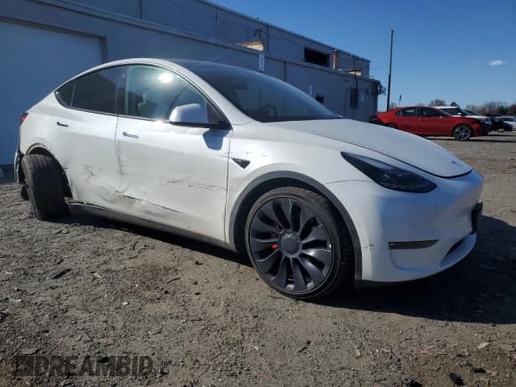✅ 2022 Tesla Model Y Performance • VIN: 7SAYGDEF9NF340245 • Lot: 91399115. Listed on Copart with 62,877 mi. Free auction sales archive from the USA and detailed vehicle history report at DreamBid. Image 4.