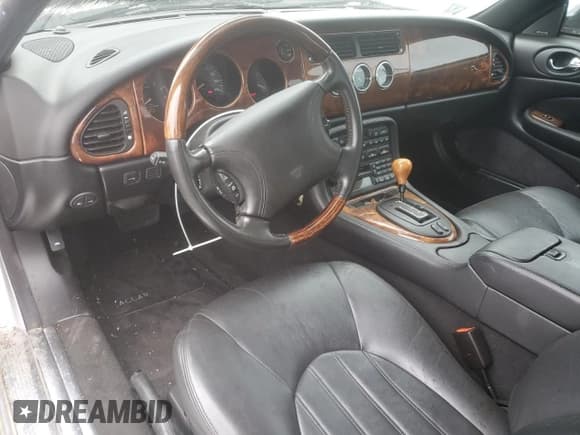 ✅ 2000 Jaguar XK • VIN: SAJJA41B6YPA01802 • Lot: 57146745. Listed on Copart with 32,208 mi. Free auction sales archive from the USA and detailed vehicle history report at DreamBid. Image 8.