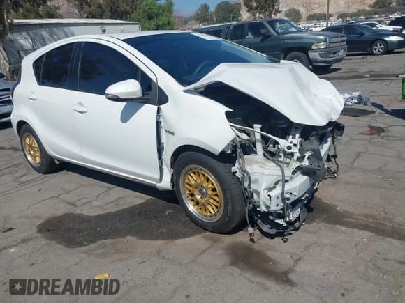 ✅ 2015 Toyota Prius One • VIN: JTDKDTB3XF1586621 • Lot: 43383594. Listed on IAAI with 100,246 mi. Free auction sales archive from the USA and detailed vehicle history report at DreamBid. Image 1.
