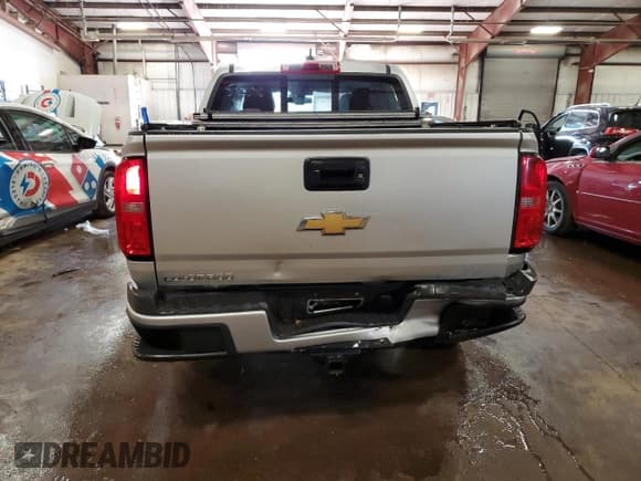 ✅ 2016 Chevrolet Colorado 4WD Z71 • VIN: 1GCGTDE34G1383218 • Лот: 80271115. Опубликован ранее на Copart с пробегом 164 907 миль. Бесплатный доступ к архиву аукционных продаж из США и подробный отчёт об истории автомобиля на DreamBid. Изображение 6.