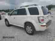 2011 Mercury Mariner z VIN 4M2CN8B71BKJ01749, wystawiony jako Copart lot #64199345 z przebiegiem 157 001 mil mil oraz Szkoda całkowita • Salvage title. Historia ofert i sprzedaży dostępna na DreamBid. Obrazek 2.