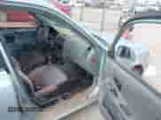 2005 Hyundai Accent GLS z VIN KMHCG45C65U576092, wystawiony jako IAAI lot #41368504 z przebiegiem 162 208 mil mil oraz . Historia ofert i sprzedaży dostępna na DreamBid. Obrazek 5.