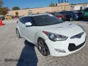 ✅ 2013 Hyundai Veloster w/Black Int • VIN: KMHTC6AD5DU104972 • Lot: 40518357. Wystawiony na IAAI z przebiegiem 191 284 mil. Bezpłatny archiwum sprzedaży aukcyjnych z USA i szczegółowy raport historii pojazdu na DreamBid. Zdjęcie 1.