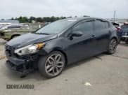 ✅ 2015 Kia Forte SX • VIN: KNAFZ5A37F5283057 • Лот: 64179155. Опубликован ранее на Copart с пробегом 111 962 миль. Бесплатный доступ к архиву аукционных продаж из США и подробный отчёт об истории автомобиля на DreamBid. Изображение 1.