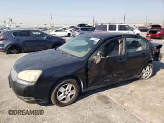 2005 Chevrolet Malibu z VIN 1G1ZS52F45F139500, wystawiony jako Copart lot #74115894 z przebiegiem 125 004 mil mil oraz Szkoda całkowita • Salvage title. Historia ofert i sprzedaży dostępna na DreamBid. Obrazek 1.