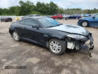 2007 Hyundai Tiburon GS с VIN KMHHM66DX7U250719, выставлен на аукционе Copart как лот 64951335 с пробегом 208 422 миль миль и Списание • Salvage title. История ставок и продаж доступна на DreamBid. Изображение 4.