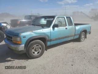 ✅ 1996 Dodge Dakota • VIN: 1B7GL23X8TS649712 • Lot: 76761044. Listed on Copart with 128,947 mi. Free auction sales archive from the USA and detailed vehicle history report at DreamBid. Image 1.