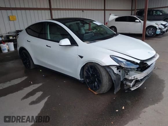 ✅ 2023 Tesla Model Y Long Range • VIN: 7SAYGAEE0PF787216 • Lot: 41589954. Listed on IAAI with 17,985 mi. Free auction sales archive from the USA and detailed vehicle history report at DreamBid. Image 1.