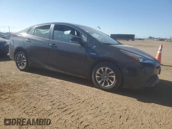 2020 Toyota Prius L Eco с VIN JTDKARFU2L3114427, выставлен на аукционе Copart как лот 57138115 с пробегом 255 617 миль миль и Списание • Salvage title. История ставок и продаж доступна на DreamBid. Изображение 4.