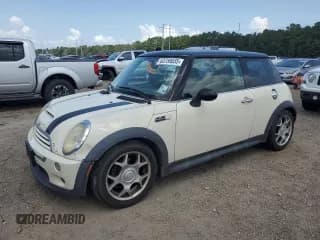 ✅ 2004 MINI Hardtop S • VIN: WMWRE33434TD81033 • Lot: 63759035. Listed on Copart with 319,648 mi. Free auction sales archive from the USA and detailed vehicle history report at DreamBid. Image 1.