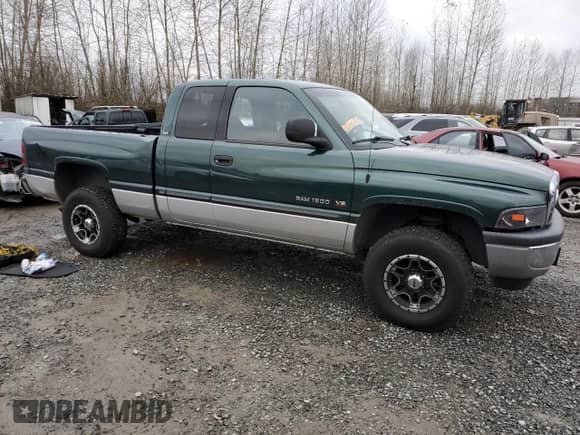 2001 Dodge 1500 z VIN 3B7HF13Z61M255316, wystawiony jako Copart lot #81778454 z przebiegiem 161 330 mil mil oraz Szkoda całkowita • Salvage title. Historia ofert i sprzedaży dostępna na DreamBid. Obrazek 4.