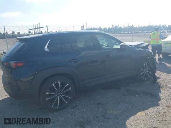 ✅ 2023 Mazda CX-50 S Premium Plus • VIN: 7MMVABEM1PN141344 • Lot: 41473823. Wystawiony na IAAI z przebiegiem 12 120 mil. Bezpłatny archiwum sprzedaży aukcyjnych z USA i szczegółowy raport historii pojazdu na DreamBid. Zdjęcie 4.