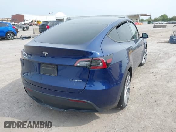 ✅ 2023 Tesla Model Y Long Range • VIN: 7SAYGDEE5PA076268 • Lot: 43140234. Wystawiony na IAAI z przebiegiem 26 918 mil. Bezpłatny archiwum sprzedaży aukcyjnych z USA i szczegółowy raport historii pojazdu na DreamBid. Zdjęcie 4.
