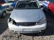 ✅ 2005 Ford Focus S • VIN: 1FAFP34N05W290649 • Лот: 90919625. Опубликован ранее на Copart с пробегом 242 434 миль. Бесплатный доступ к архиву аукционных продаж из США и подробный отчёт об истории автомобиля на DreamBid. Изображение 13.