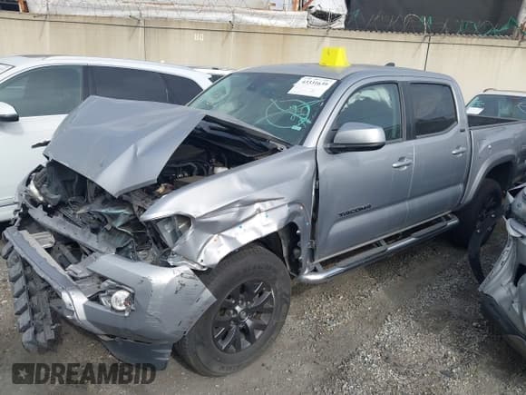 ✅ 2020 Toyota Tacoma SR5 • VIN: 5TFAZ5CN8LX094154 • Lot: 43331639. Listed on IAAI with 67,089 mi. Free auction sales archive from the USA and detailed vehicle history report at DreamBid. Image 2.