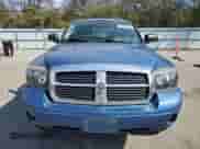 2005 Dodge Dakota Laramie z VIN 1D7HW58N25S200250, wystawiony jako Copart lot #74635094 z przebiegiem 230 871 mil mil oraz Czysty tytuł • Clean title. Historia ofert i sprzedaży dostępna na DreamBid. Obrazek 5.