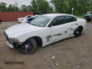 ✅ 2013 Dodge Charger Police • VIN: 2C3CDXAG3DH675336 • Lot: 59858075. Listed on Copart with 228,481 mi. Free auction sales archive from the USA and detailed vehicle history report at DreamBid. Image 1.