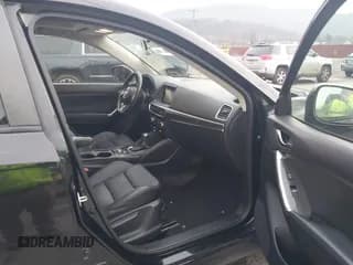 ✅ 2016 Mazda CX-5 Grand Touring • VIN: JM3KE4DY2G0833771 • Lot: 43758167. Wystawiony na IAAI z przebiegiem 101 128 mil. Bezpłatny archiwum sprzedaży aukcyjnych z USA i szczegółowy raport historii pojazdu na DreamBid. Zdjęcie 5.