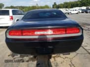 ✅ 2014 Dodge Challenger SXT • VIN: 2C3CDYAGXEH289603 • Lot: 71838614. Wystawiony na Copart z przebiegiem 222 379 mil. Bezpłatny archiwum sprzedaży aukcyjnych z USA i szczegółowy raport historii pojazdu na DreamBid. Zdjęcie 6.