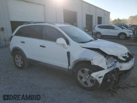 2013 Chevrolet Captiva Sport LS with VIN 3GNAL2EK2DS576132, listed as a Copart auction lot 82001664 with 154,225 mi miles and Salvage title. Bid and sale history available at DreamBid. Image 4.