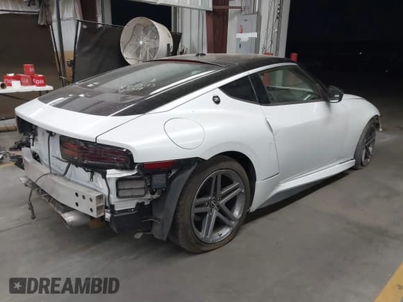 ✅ 2024 Nissan Z Sport • VIN: JN1BZ4AHXRM365319 • Lot: 42762246. Listed on IAAI with 6,370 mi. Free auction sales archive from the USA and detailed vehicle history report at DreamBid. Image 4.