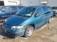 ✅ 2000 Chrysler Voyager SE • VIN: 1C4GJ44G1YB729215 • Lot: 41313821. Wystawiony na IAAI z przebiegiem 147 467 mil. Bezpłatny archiwum sprzedaży aukcyjnych z USA i szczegółowy raport historii pojazdu na DreamBid. Zdjęcie 2.