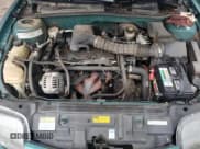 ✅ 1999 Pontiac Sunfire SE • VIN: 1G2JB1241X7537440 • Lot: 73252574. Wystawiony na Copart z przebiegiem 225 128 mil. Bezpłatny archiwum sprzedaży aukcyjnych z USA i szczegółowy raport historii pojazdu na DreamBid. Zdjęcie 11.