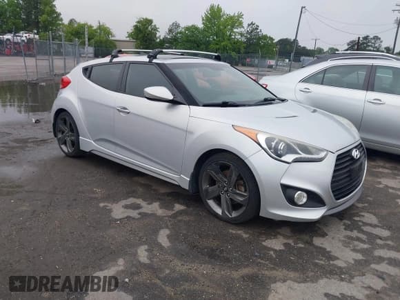 ✅ 2014 Hyundai Veloster Turbo • VIN: KMHTC6AE5EU198135 • Lot: 42236953. Wystawiony na IAAI z przebiegiem 163 139 mil. Bezpłatny archiwum sprzedaży aukcyjnych z USA i szczegółowy raport historii pojazdu na DreamBid. Zdjęcie 1.
