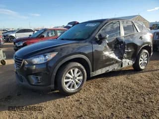 ✅ 2016 Mazda CX-5 Touring • VIN: JM3KE4CY3G0863363 • Lot: 86116175. Wystawiony na Copart z przebiegiem 150 480 mil. Bezpłatny archiwum sprzedaży aukcyjnych z USA i szczegółowy raport historii pojazdu na DreamBid. Zdjęcie 1.