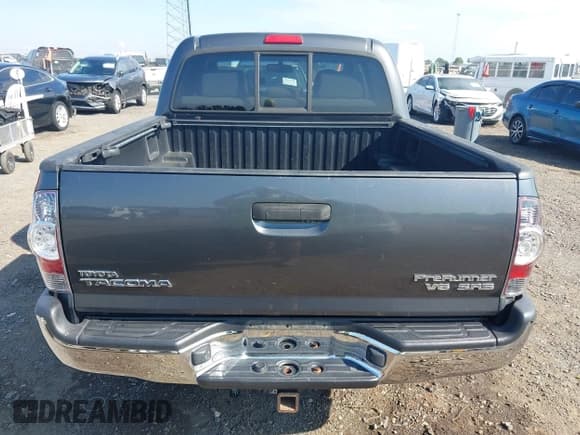 ✅ 2011 Toyota Tacoma PreRunner • VIN: 3TMJU4GN0BM110452 • Lot: 43183116. Listed on IAAI with 233,826 mi. Free auction sales archive from the USA and detailed vehicle history report at DreamBid. Image 16.
