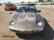 ✅ 1984 Porsche 928 • VIN: WP0JB0929ES860736 • Lot: 63927165. Wystawiony na Copart z przebiegiem 125 989 mil. Bezpłatny archiwum sprzedaży aukcyjnych z USA i szczegółowy raport historii pojazdu na DreamBid. Zdjęcie 5.