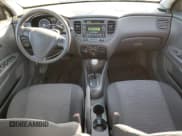 ✅ 2009 Kia Rio LX • VIN: KNADE243896568054 • Лот: 82198715. Опубликован ранее на Copart с пробегом 140 065 миль. Бесплатный доступ к архиву аукционных продаж из США и подробный отчёт об истории автомобиля на DreamBid. Изображение 8.