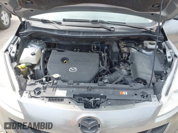 ✅ 2012 Mazda 5 Grand Touring • VIN: JM1CW2DL1C0126545 • Lot: 42301130. Listed on IAAI with 151,212 mi. Free auction sales archive from the USA and detailed vehicle history report at DreamBid. Image 10.