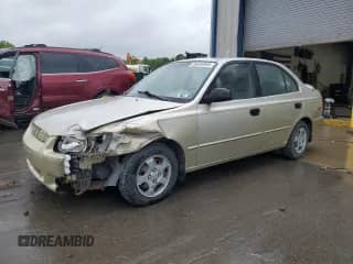 2002 Hyundai Accent GL z VIN KMHCG45C12U355561, wystawiony jako Copart lot #54546945 z przebiegiem 22 893 mil mil oraz Szkoda całkowita • Salvage title. Historia ofert i sprzedaży dostępna na DreamBid. Obrazek 1.