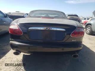 ✅ 2001 Jaguar XK • VIN: SAJDA42B51PA15157 • Лот: 67139634. Опубликован ранее на Copart с пробегом 110 506 миль. Бесплатный доступ к архиву аукционных продаж из США и подробный отчёт об истории автомобиля на DreamBid. Изображение 6.