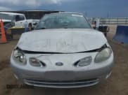 ✅ 2000 Ford Escort ZX2 • VIN: 3FAKP113XYR256067 • Lot: 54692985. Wystawiony na Copart z przebiegiem 52 853 mil. Bezpłatny archiwum sprzedaży aukcyjnych z USA i szczegółowy raport historii pojazdu na DreamBid. Zdjęcie 5.