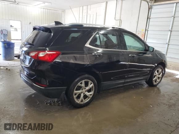 ✅ 2018 Chevrolet Equinox Premier • VIN: 2GNAXMEV6J6132420 • Lot: 89735055. Listed on Copart with 112,975 mi. Free auction sales archive from the USA and detailed vehicle history report at DreamBid. Image 3.